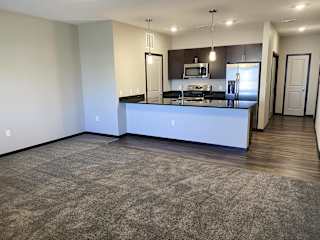 View of the kitchen from the living room at the villas at mahoney park