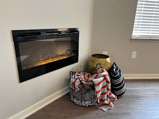 Cozy electric fireplace at the villas at mahoney park