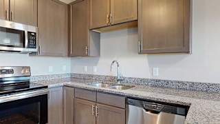 kitchen counters and cabinets, showcasing ample storage and stainless steel sink with a modern faucet