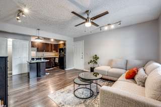 a living room with a couch and a table