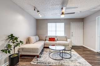 a living room with a couch and a coffee table