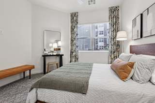 Window with Curtains in a Bedroom at Coya Apartments, Las Vegas, Nevada