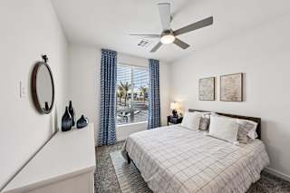 Bedroom With Expansive Window at Fora Apartments, Las Vegas Nevada