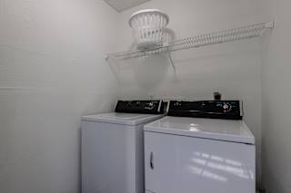 A laundry area in a model unit at Skyler Ridge Complex, featuring a washer & dryer hookups.