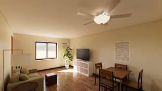 A living room with a brown table and chairs, a television, and a plant.
