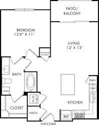 A floor plan of a small apartment with a bedroom, bathroom, kitchen, and living room.