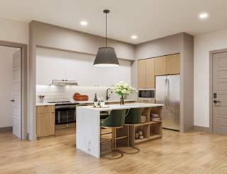 a kitchen with a white island with three stools at Bemiston Place Apartments, Clayton, 63105