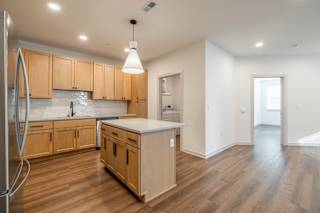 Kitchen with wooden cabinets and wooden counter at Timber Club, St. Peters, MO, 63304
