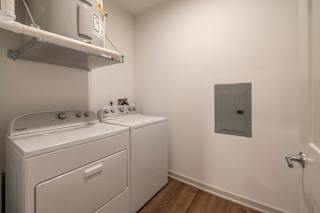 Laundry Room with White machines at Timber Club, Missouri