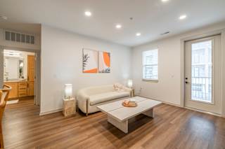 Living Room with white sofa at Timber Club, St. Peters