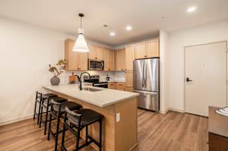Kitchen with Appliances and Refrigerator at Timber Club, St. Peters, 63304