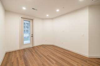 Bright room with wooden flooring at Timber Club, St. Peters, 63304