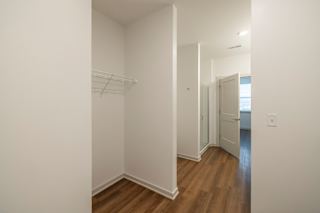 White Hallway with Wooden Floor at Timber Club, St. Peters, Missouri
