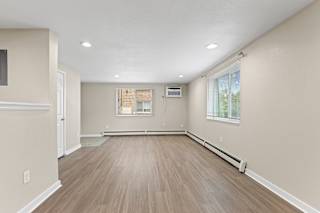 Multiple windows in a room at Kingsbrook Arms, Englewood, Co