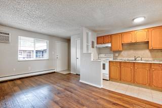 white stove top oven in kitchen  at Kingsbrook Arms, Englewood, 80113