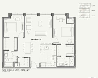 A black and white image of a two bedroom apartment layout.
