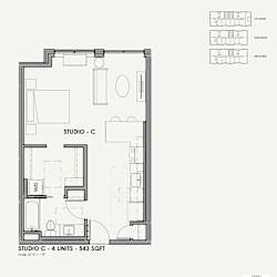 A floor plan of a studio apartment with labeled rooms and furniture.