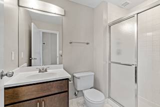 Modern Bathroom with Framed Mirror at The Cosmopolitan, Minnesota