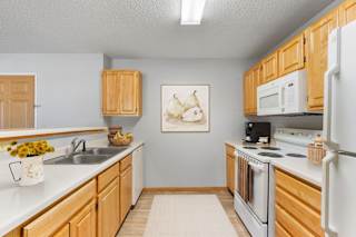 Kennsington Three Bedroom Two Bathroom Floor Plan at The Preserve at Commerce in Rogers, MN 55374