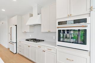 Matte White Cafe Appliances at Lilia Apartments, Minnesota, 55118