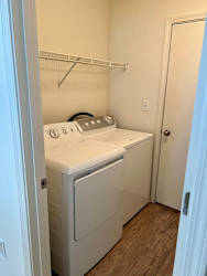 a washer and dryer in a room with a closet at Shenandoah Properties in Lafayette, IN 47905