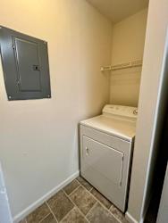 an empty laundry room with a washer and dryer in it at Shenandoah Properties in Lafayette, IN 47905