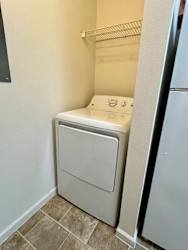 the washer and dryer in the laundry room of a home at Shenandoah Properties in Lafayette, IN 47905