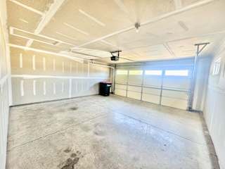 Willow 2-car garage inside from door at Hawthorne Properties in Lafayette, IN 47905