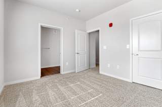 Spacious bedroom with attached bathroom  at Aventura at Hawk Ridge, Lake St Louis, Missouri