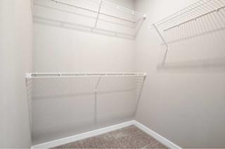 Empty white shelves in a room