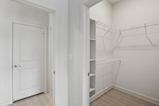 Walk-in closet with wire shelving and builtin storage at Cantarra Apartments, Texas, 78653