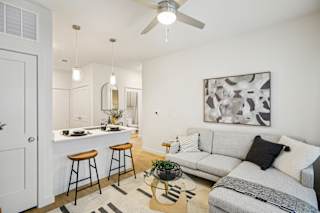 Open living space with sofa  at Matador Apartments, Austin, Texas
