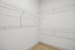 A white wall with a white shelf on it. at ThreeTwenty at the Vybe Apartments, Kyle, 78640