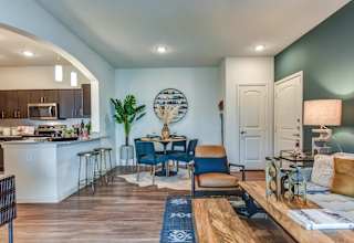 Open concept living room and dining area 1 at High Point Preserve Apartments, Austin