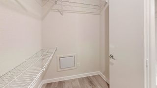 Walk-in closet with wire shelving at Bridge at Windsor Park Apartments, Austin