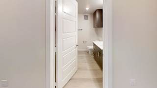 a bathroom with a bathtub and shower in a 555 waverly unit at Avery Ranch, Austin, 78717