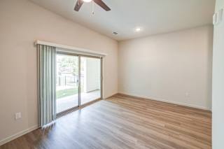 a living room with hardwood floors and a ceiling fan at Avery Ranch, Texas, 78717