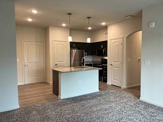 B1 Kitchen at Bridge at Delco Flats Apartments, Austin, TX