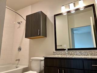 B1 Primary Bathroom at Bridge at Delco Flats Apartments, Austin, 78724