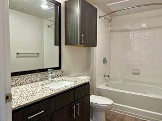 B1 2nd Bathroom at Bridge at Delco Flats Apartments, Austin, Texas