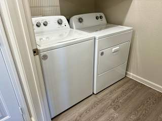 Inunit laundry with side by side washer and dryer at High Point Preserve Apartments, Austin, 78724