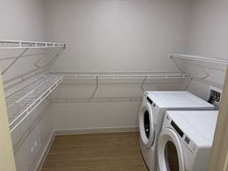 A laundry room with a washer and dryer.