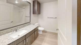 a bathroom with a sink toilet and mirror at Avery Ranch, Austin, 78717