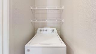 a laundry room with a washer and dryer  at Avery Ranch, Texas, 78717