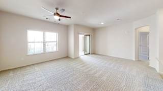 an empty living room with a ceiling fan and a window at Avery Ranch, Texas, 78717