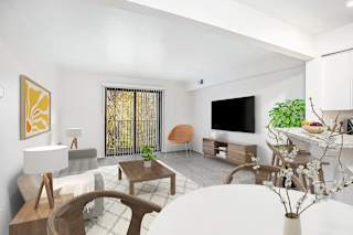 Living room with dining area and balcony view at Brentwood Park Apartments, Nebraska, 68128