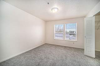 Large bedroom with walk in closet at Canal 2 Apartments, Michigan, 48917