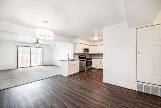 Living room and kitchen at The Crossings Apartments, Grand Rapids, Michigan