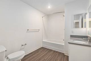 Main bathroom with hard surface flooring at Eagle Ridge Apartment Homes, Traverse City, MI 49685