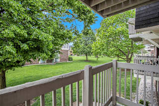 the view from a private balcony at Fairlane Apartments in Springfield, MI